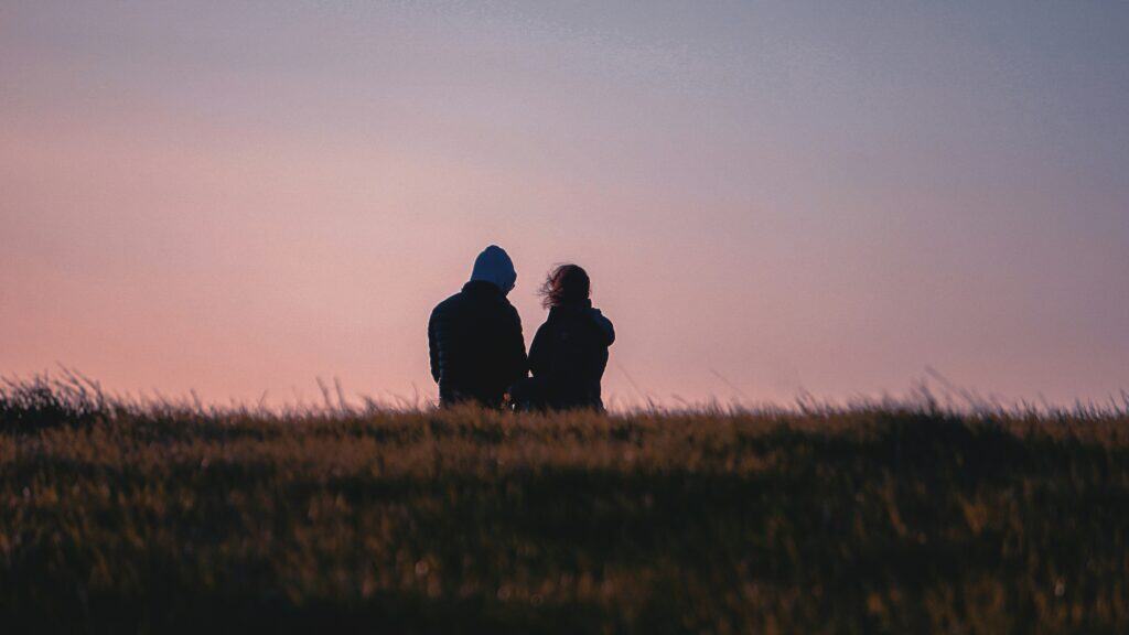 shadow of couple against sunset
