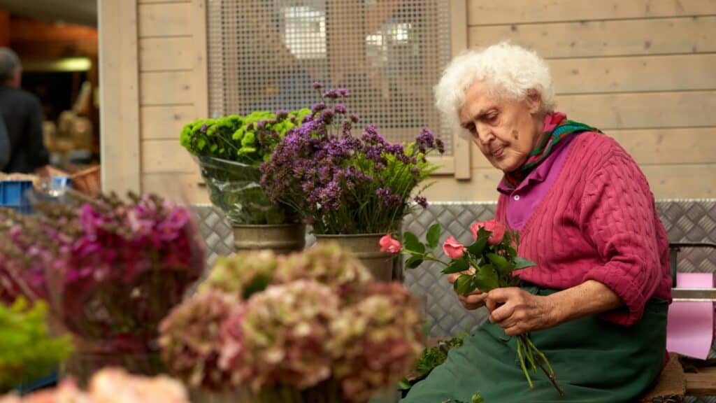 Older woman with flowers