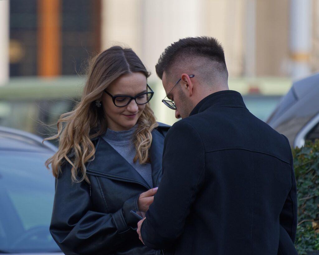 couple talking outside close together